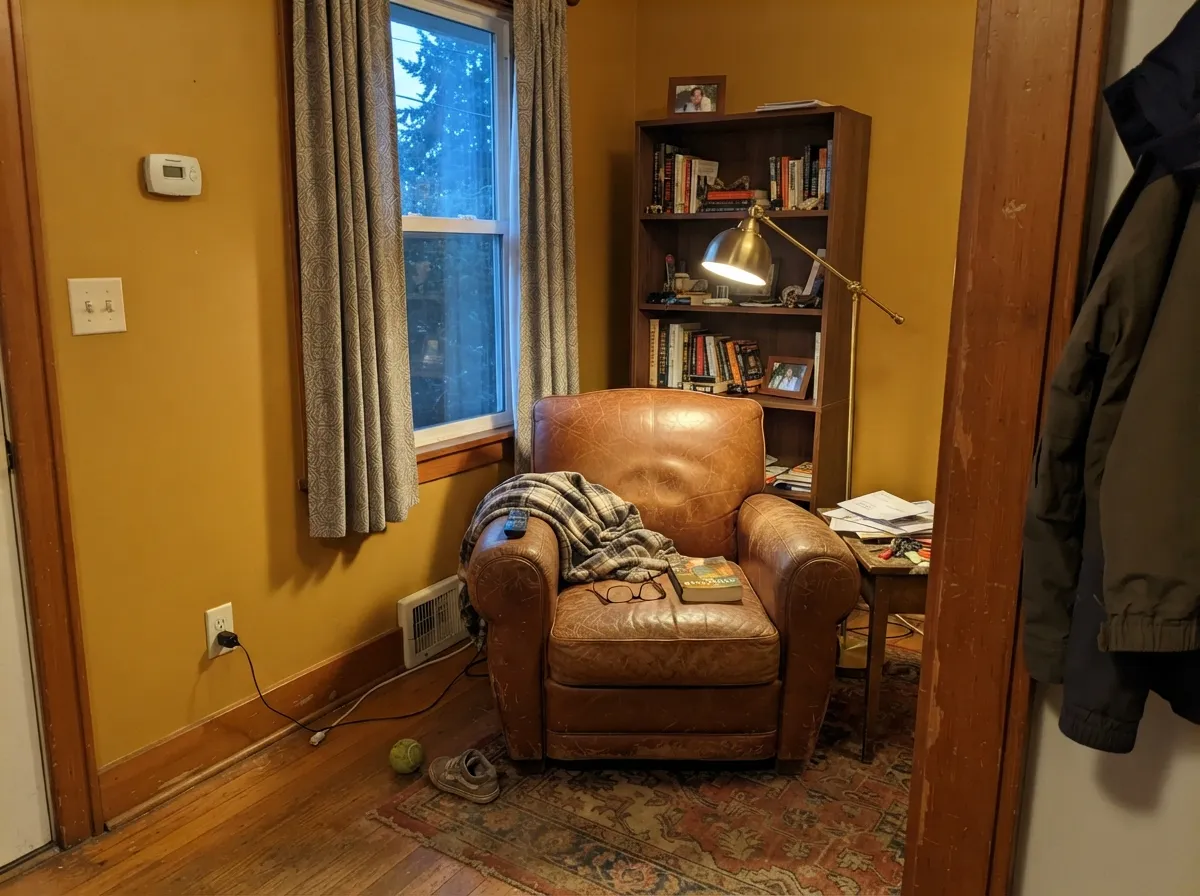 With leather, walnut and lamp light this is the library-warm mood the color was made for.