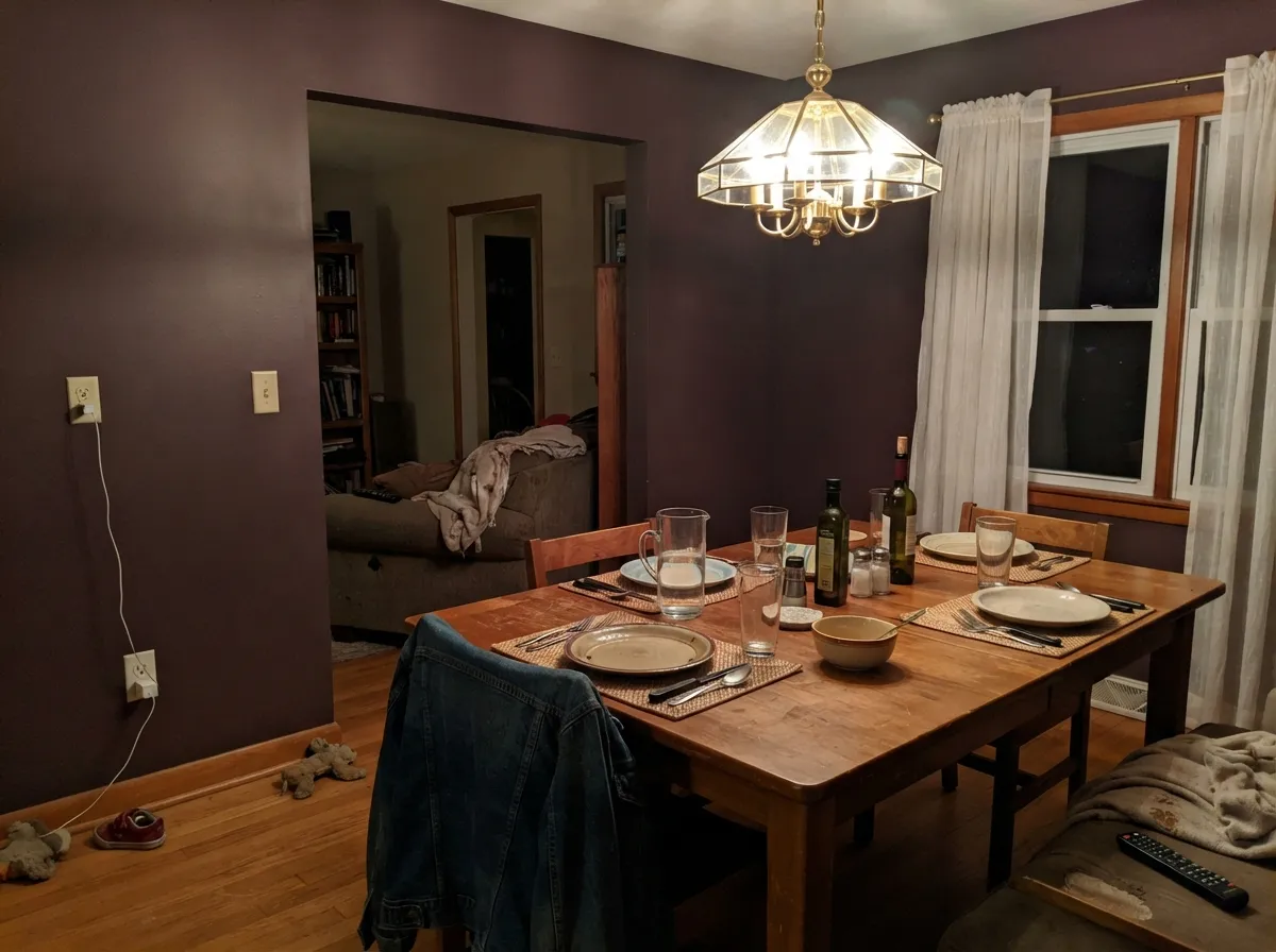 Dining rooms run on lamplight, which is exactly the light this color wants — rich and warm, not purple.