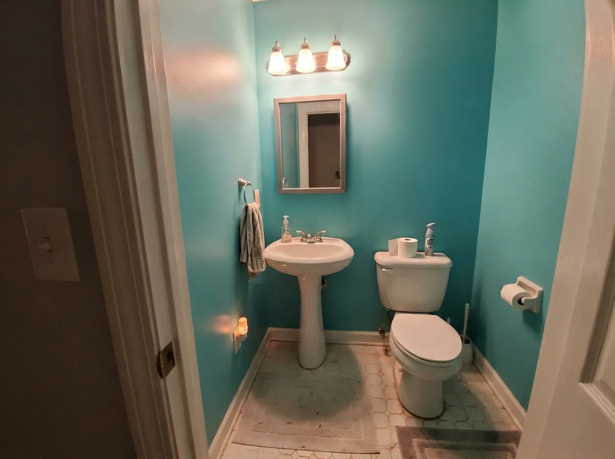 Small rooms take this much saturation easily — crisp white trim keeps the blue reading clean instead of heavy.