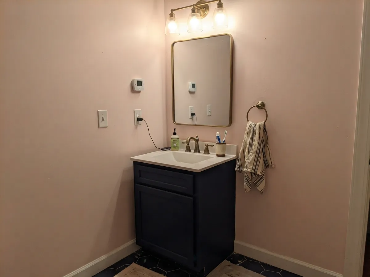 No window at all, and the room still feels warm — the reason this color keeps turning up in powder rooms and interior halls.