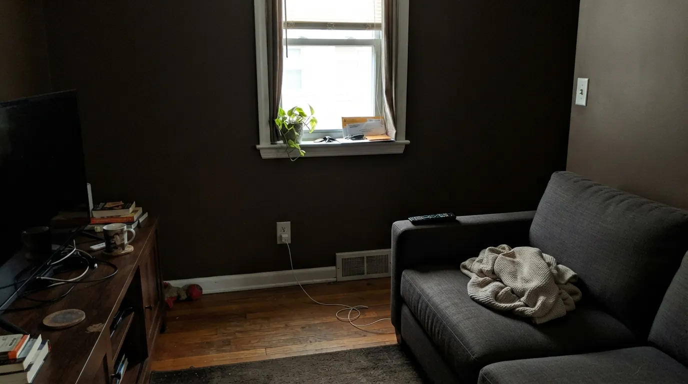 The honest shot: a whole room with no extra light, and the color stops reading as brown — the setup behind every "it just looks like a black hole" complaint.