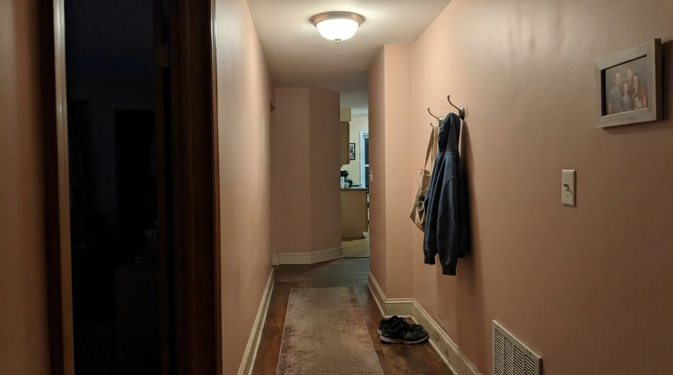 The honest shot: without real daylight the apricot drains out and the wall reads muddy beige, not pink — the exact letdown behind most of this color's bad reviews.