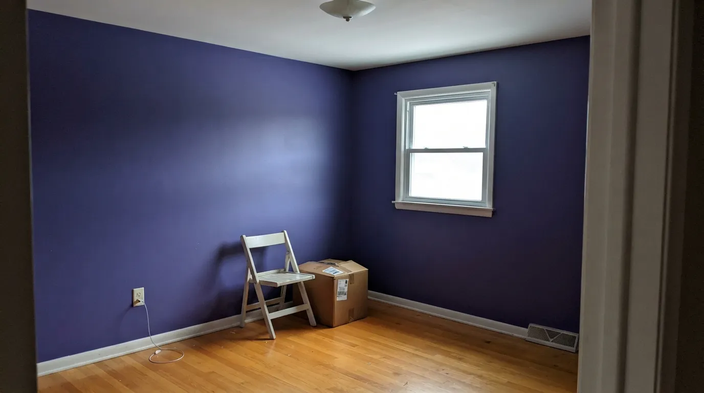 The honest shot: in cool north light with no lamps the warmth drops out and the violet goes stony blue — and honey-oak floors make it worse, not better.