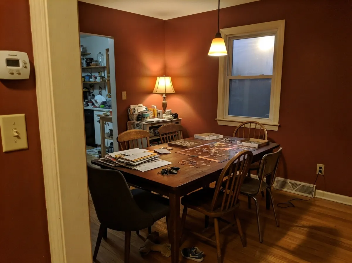 Four walls in a room used after dark: 2700K light pulls the red forward and the brown goes leathery instead of heavy.