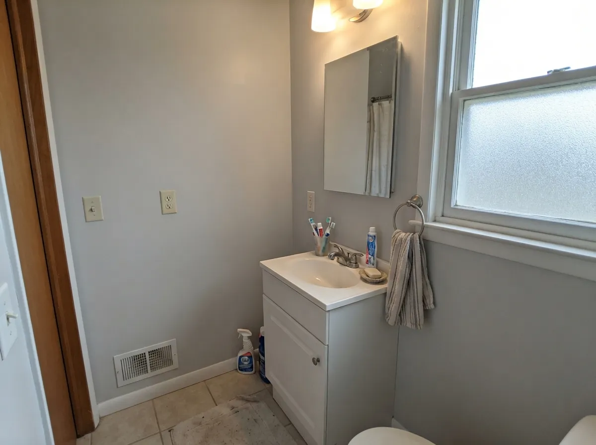 Bathrooms are the easy win: it reads clean like white, without four close walls bouncing glare back at you.