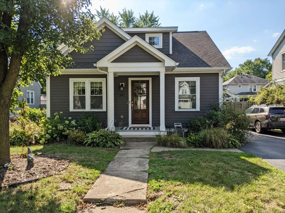Peppercorn exterior siding reading as a rich charcoal in full sun.