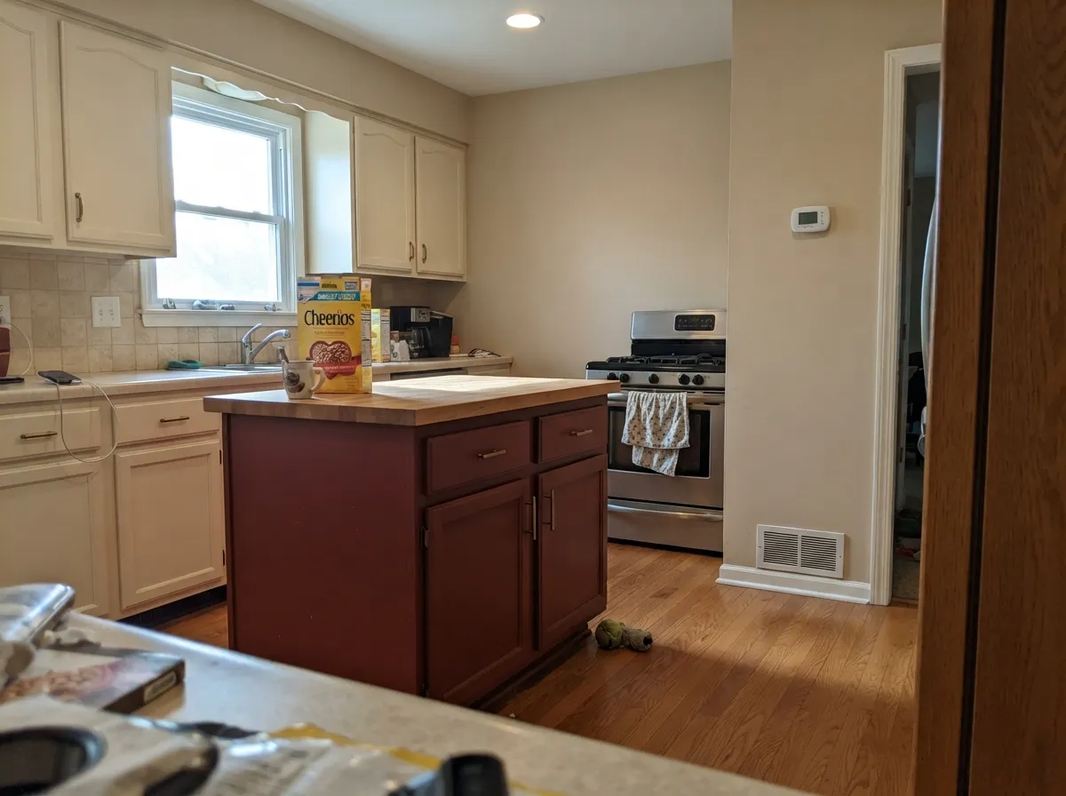 On an island against lighter perimeter cabinets, it carries all the drama without darkening the whole kitchen.