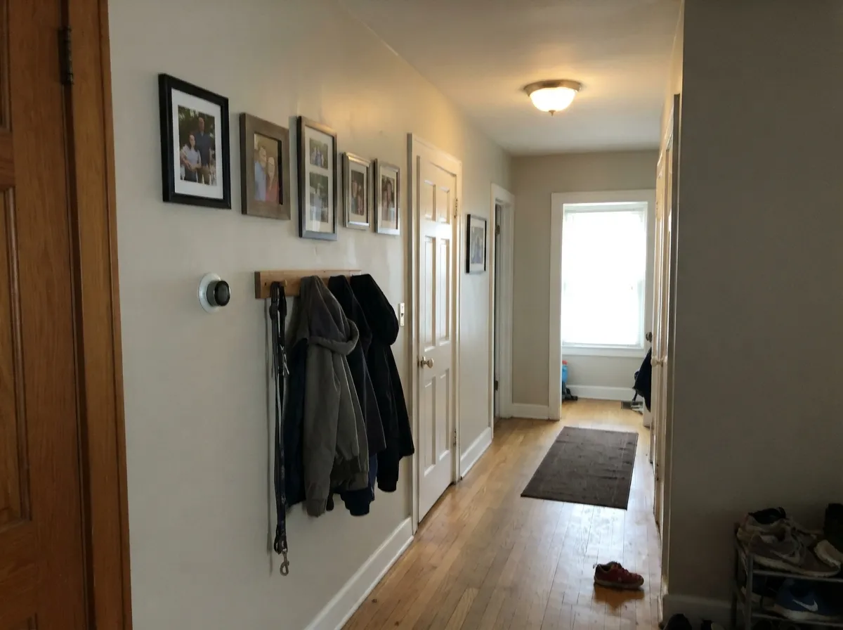 The whole-house test: hallways are where Goose Feathers earns the roll, carrying room to room without a color-cast fight.