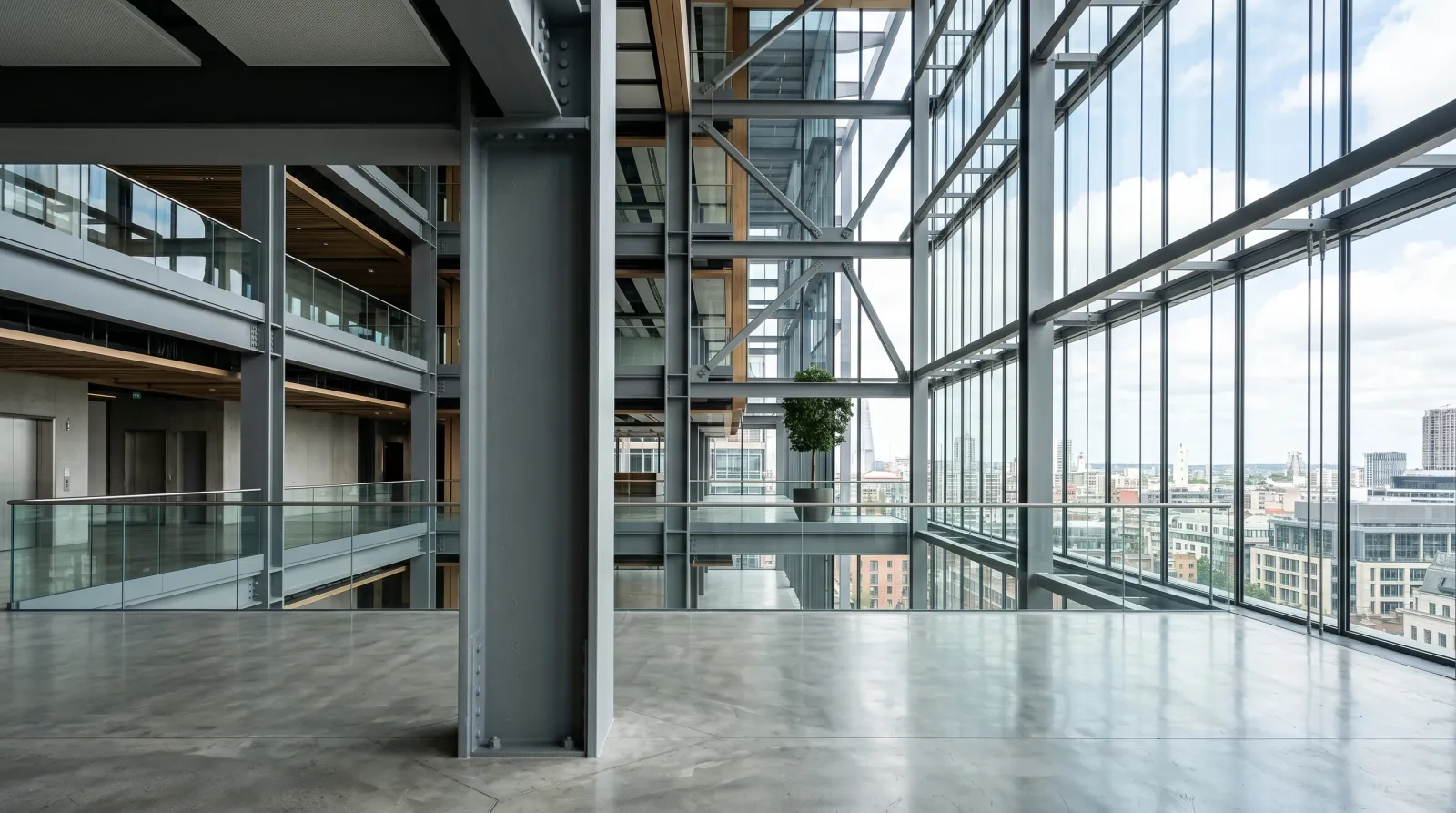 Structural steel column coated with intumescent fire paint in a commercial atrium