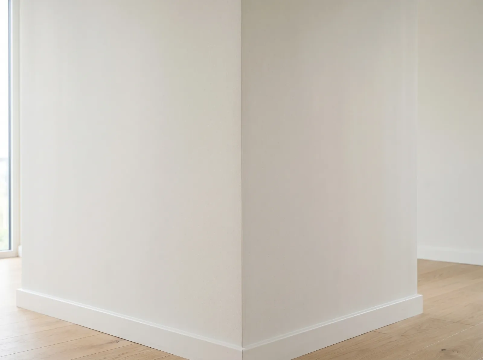 Same wall corner dry and repainted with a matte insulating coating, no condensation