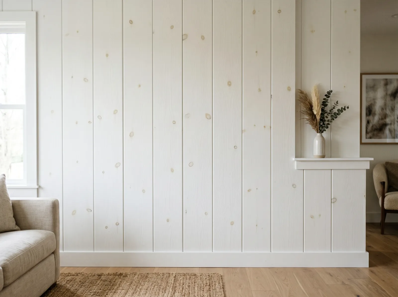 Finished white knotty pine paneling with no bleed showing around the sealed knots