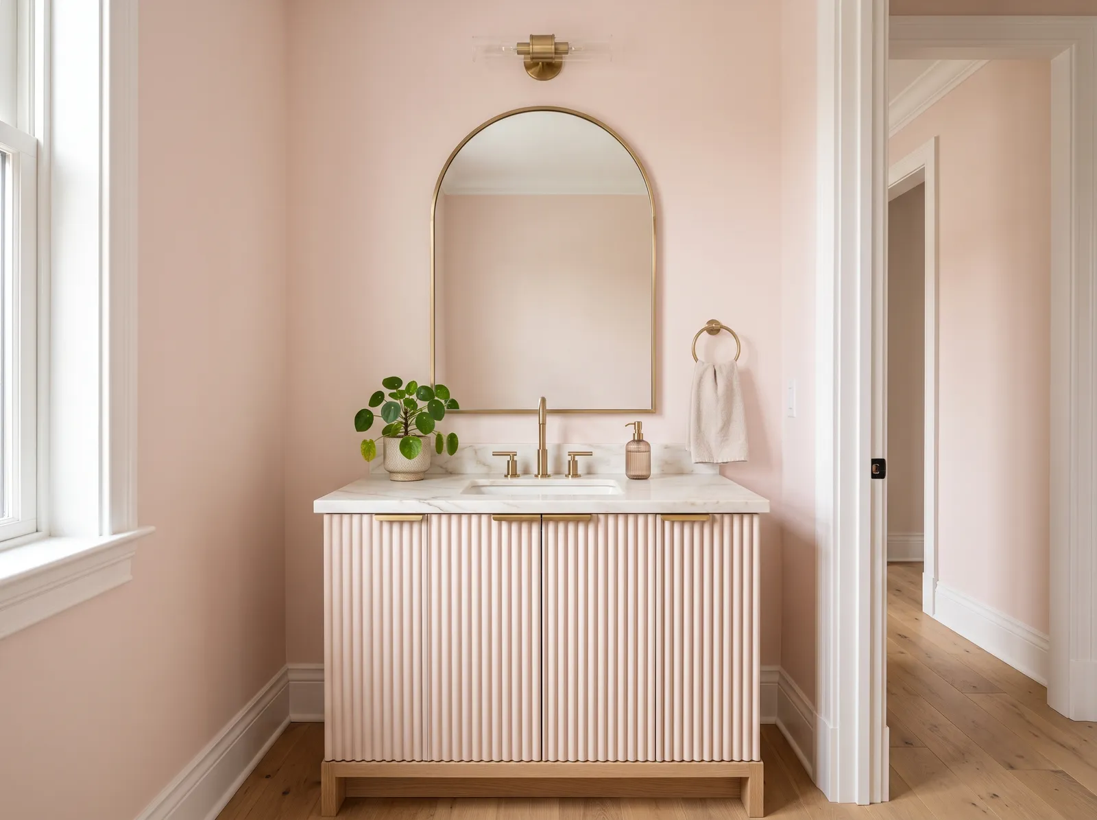 Bathroom painted in Shelled — Blush Powder Room