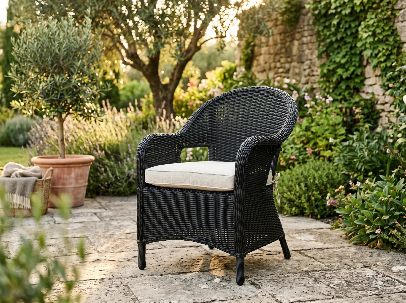 Finished repainted matte black resin wicker chair on a patio