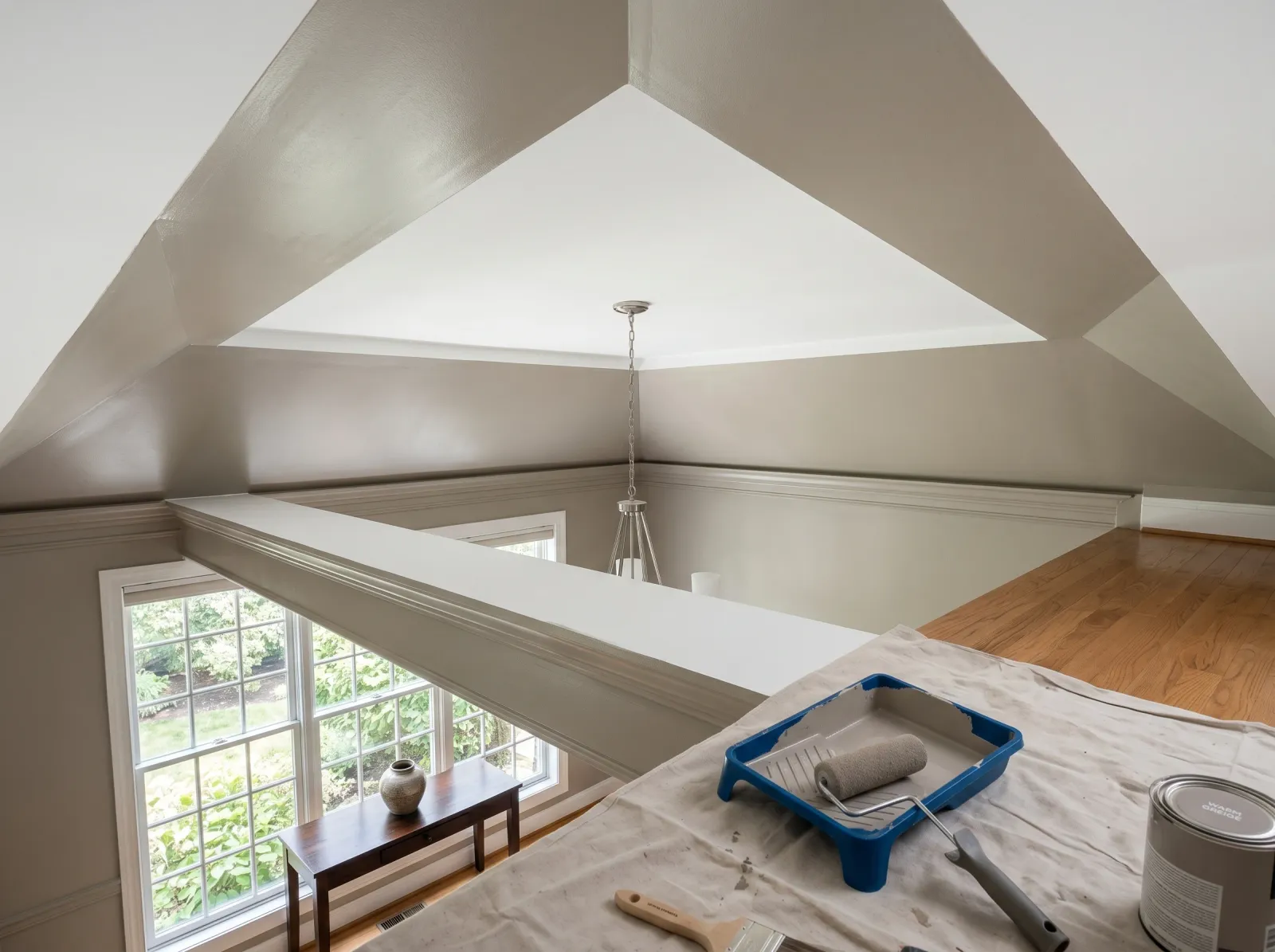Tray ceiling with the angled sides freshly painted a warm greige against the white center